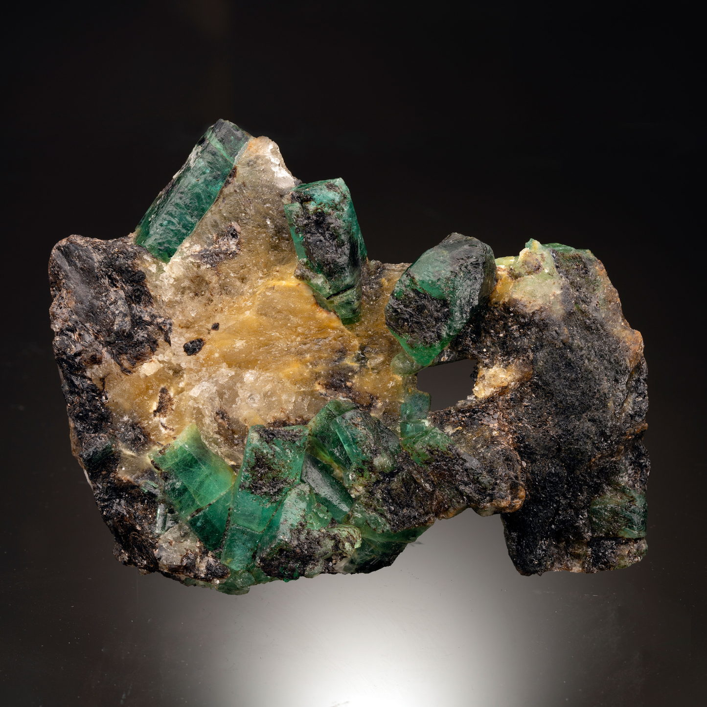 Emerald on Calcite and Biotite Matrix