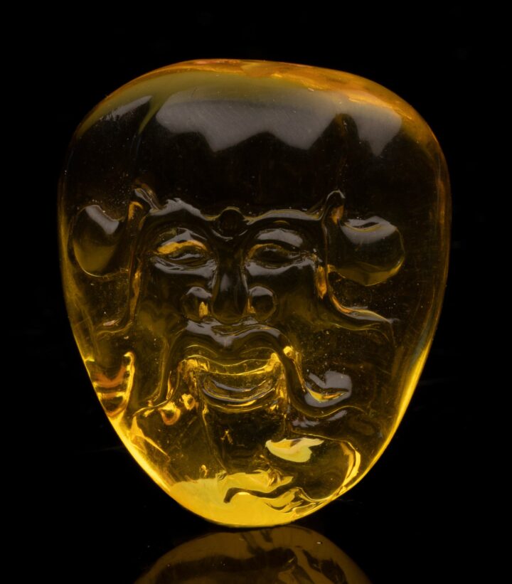 Carved Amber Celtic God // 7.61 Grams