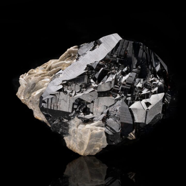 Cassiterite on Muscovite // 511 Grams