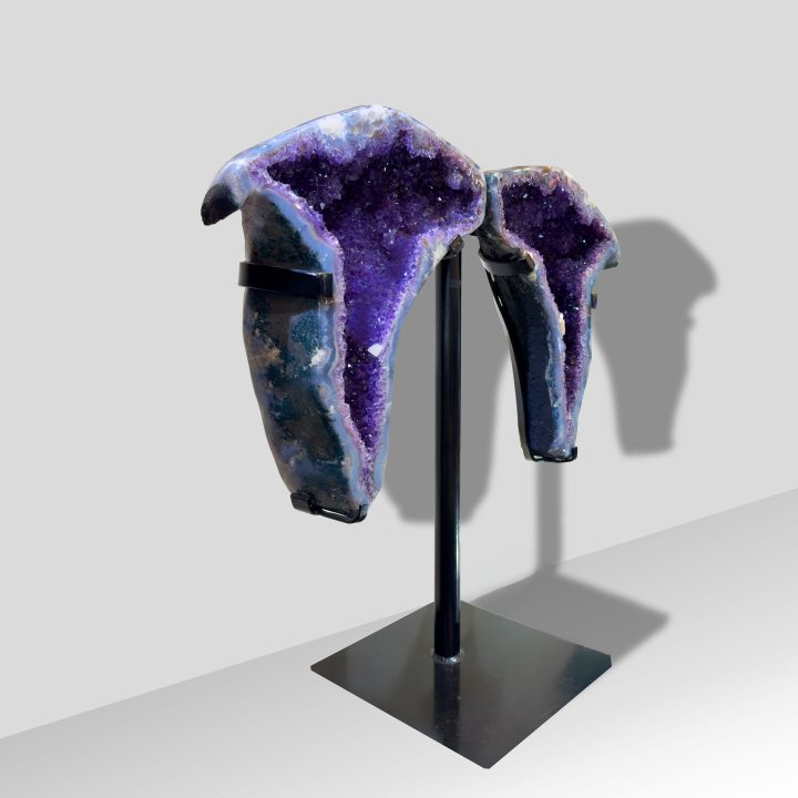 Side angle of Amethyst geode wings on stand