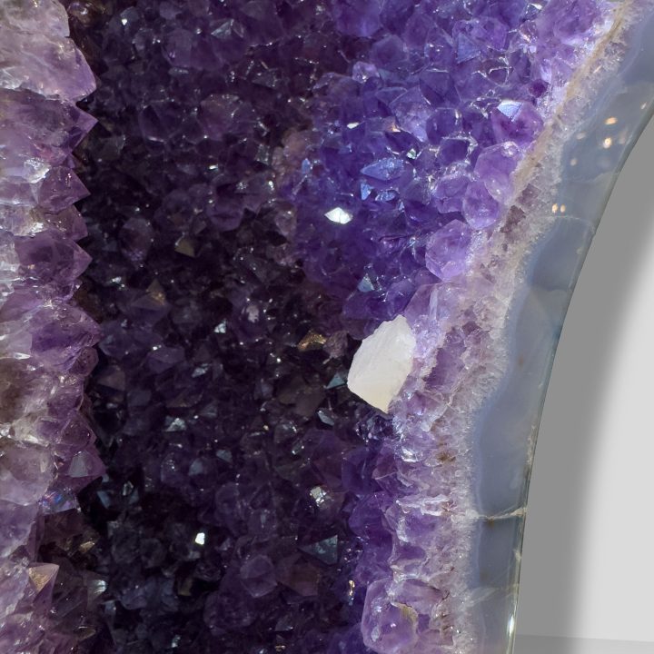 Close-up of Amethyst crystal interior with Calcite inclusion