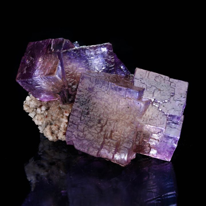Purple Fluorite cluster with Barite from Elmwood Mine Title: Barite on Purple Fluorite from Elmwood