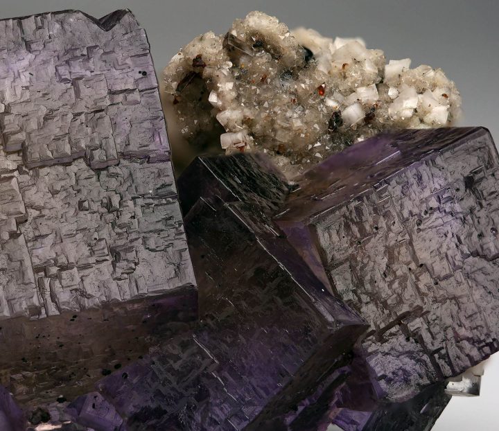 Detailed close-up of Barite on Fluorite crystal surface