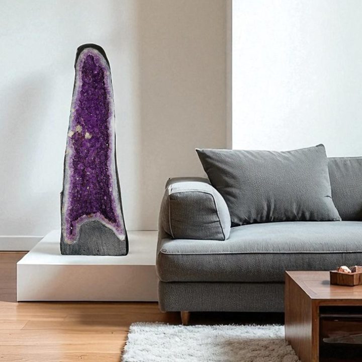 Amethyst cathedral with Calcite crystals displayed in modern living room
