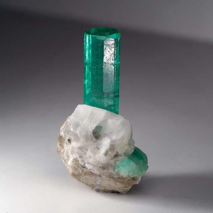 Colombian Emerald on Calcite matrix – prismatic faces