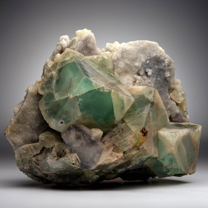 Chinese Green Fluorite specimen on Quartz matrix – close-up