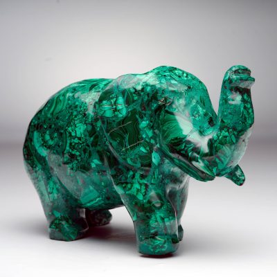Malachite elephant figurine with polished emerald tones and natural patterns