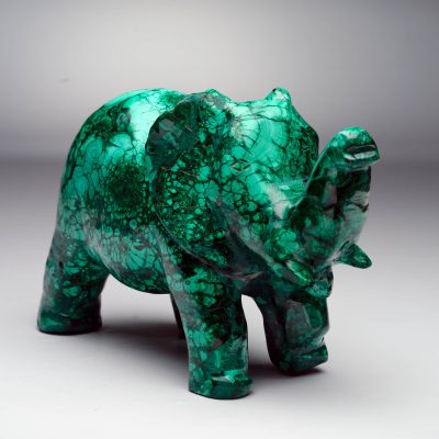 Polished Malachite elephant with deep emerald green tones