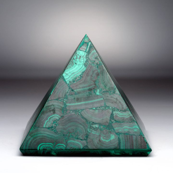Polished Malachite pyramid showing natural bullseye banding in deep green.