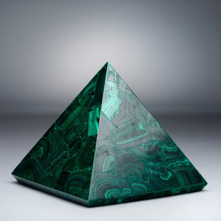 Malachite pyramid with emerald and forest green swirling patterns.