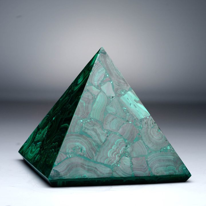 Polished Malachite pyramid with striking green concentric banding.