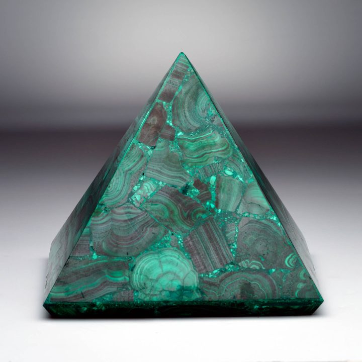 Malachite pyramid with concentric rings and polished finish