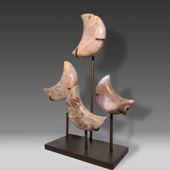 Angled view of Pink Amethyst crescent moon décor