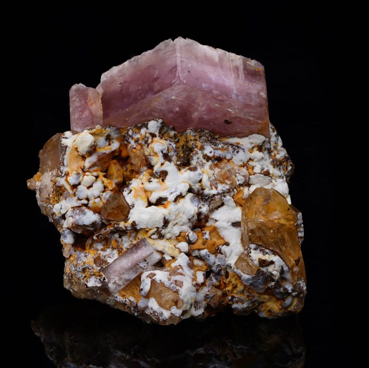 Close-up of Pink Apatite crystal structure highlighting clarity and geometry