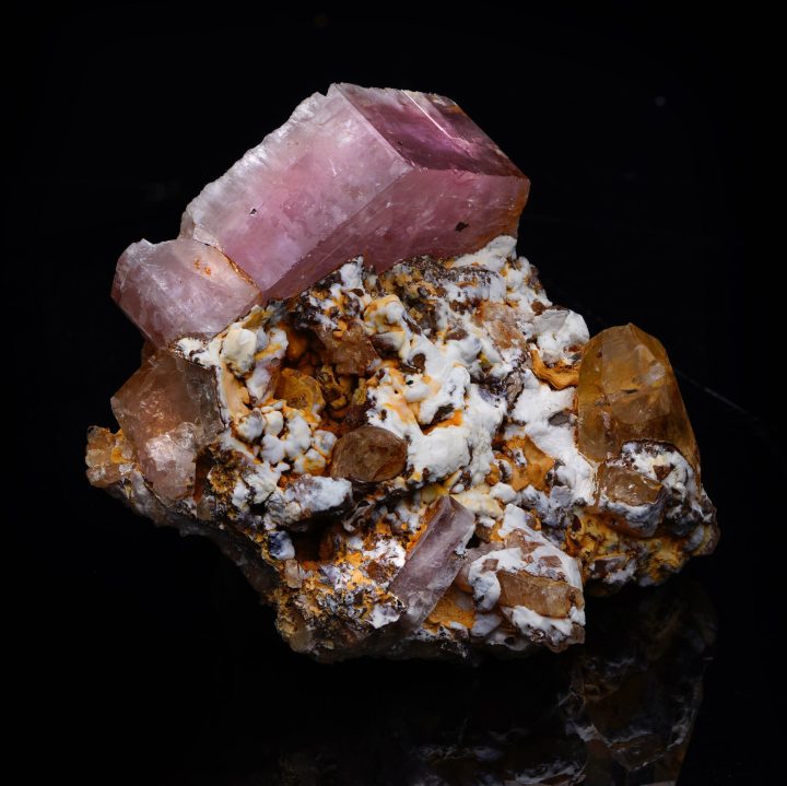 Rare Colombian Pink Apatite specimen displaying bright saturated coloration