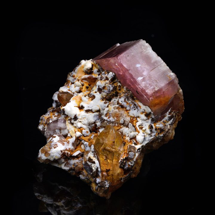 Fine Pink Apatite mineral with translucent termination and natural matrix