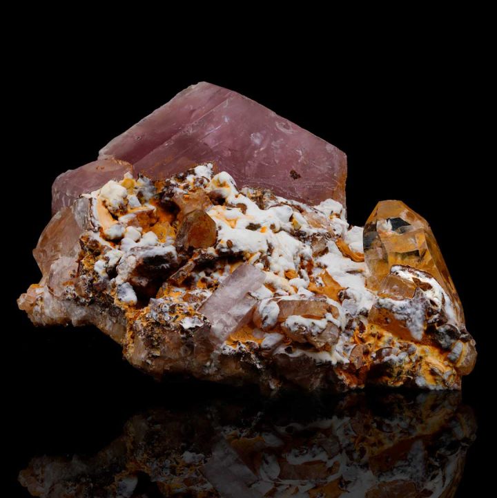 Colombian Pink Apatite showing vivid rose color and intact crystal form