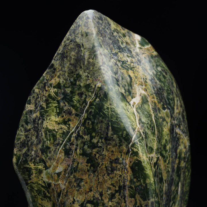 Green jade freeform specimen standing upright