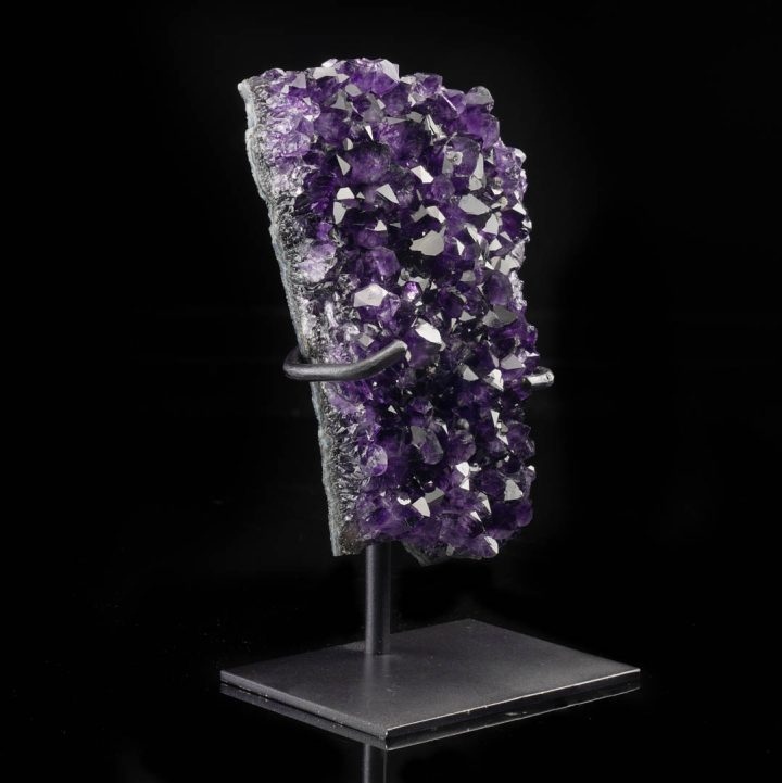 Amethyst crystal geode mounted on metal stand as a luxury gift or statement decor