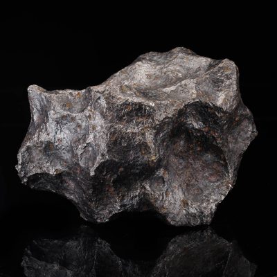 Authentic Campo del Cielo meteorite weighing 18.6 pounds with natural fusion crust