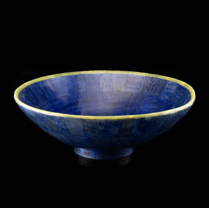 Natural lapis lazuli bowl showcasing deep blue color and jade accents