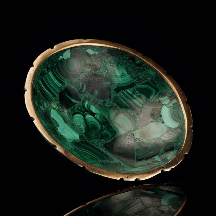 Luxury malachite bowl with natural green banding and gold edge