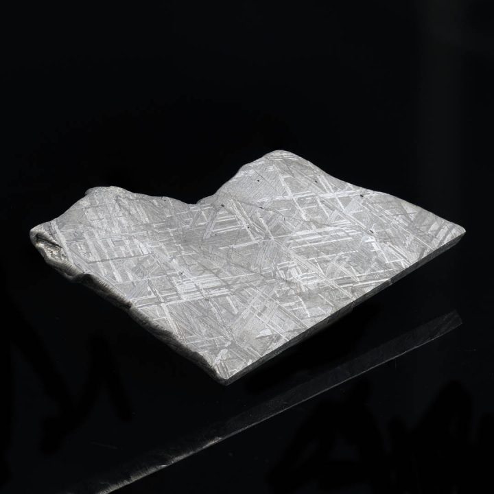 Muonionalusta meteorite slice as a luxury natural history display piece