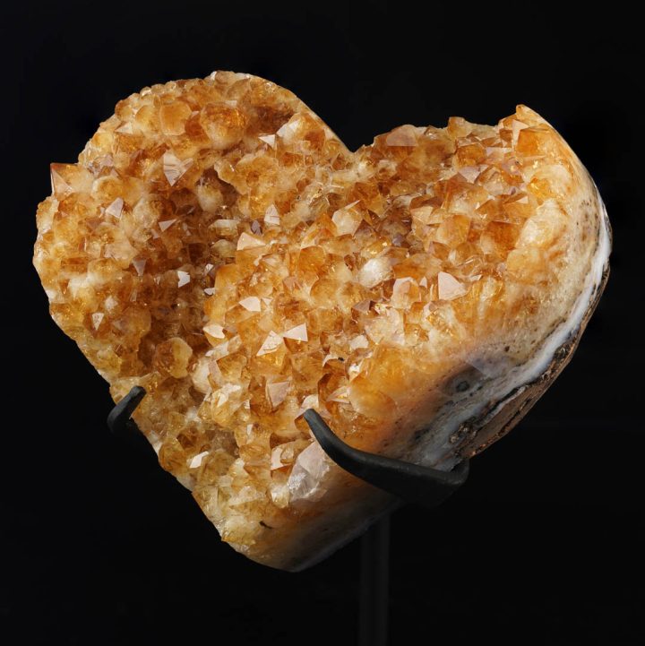Natural citrine heart showing crystal texture and golden color